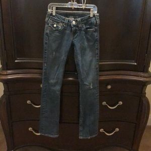 Slightly distressed True Religion jeans. Like new.